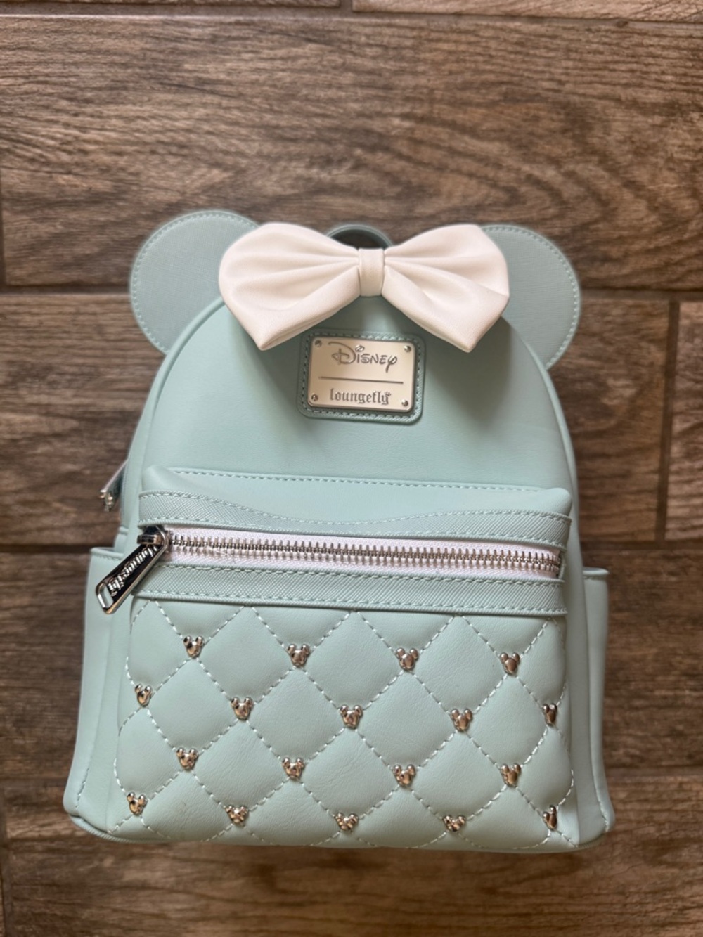 Loungefly Disney Blue Mini Backpack with White Bow